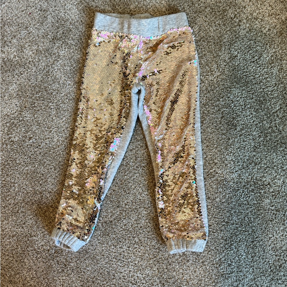 Kids gold sparkle front sweats.